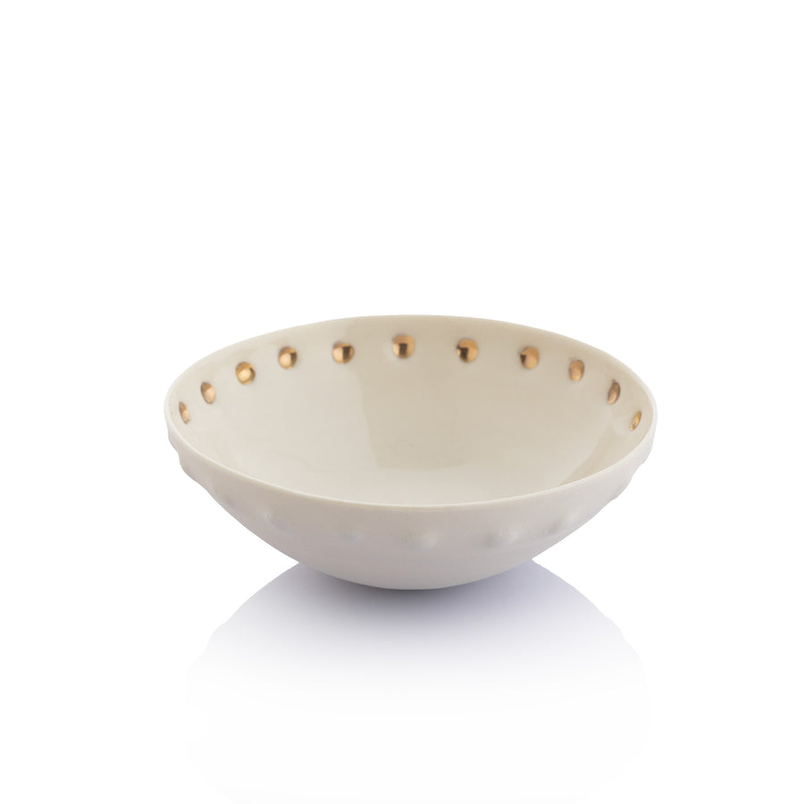 White Bowl with Shiny Holes Around the Edge